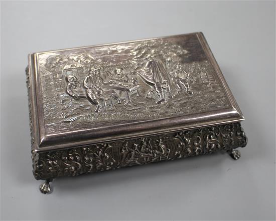 A 20th century continental embossed white metal rectangular bombe shaped cigarette? box, with wood lined interior, 14cm